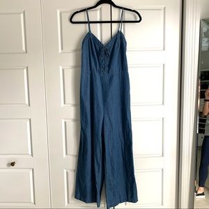 Lace-up front denim jumpsuit